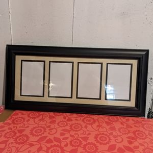4 photo frame black on sand